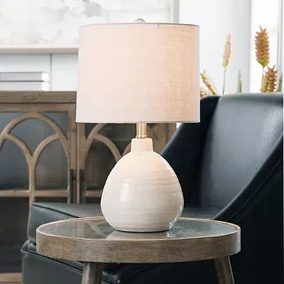 Kirkland's Smooth Ivory Ceramic Table Lamp In White