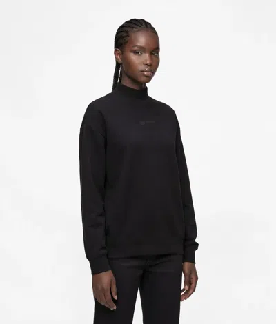 Kl Jeans Open-back Turtleneck Sweatshirt In Black
