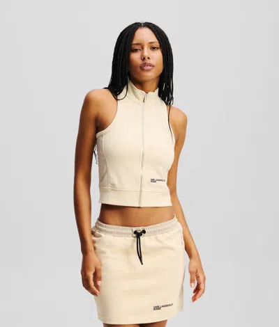 Kl Jeans Zip-front Sleeveless Top In White