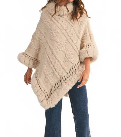 Klesis Faux Fur Trim Sweater Poncho In Cream In Neutral
