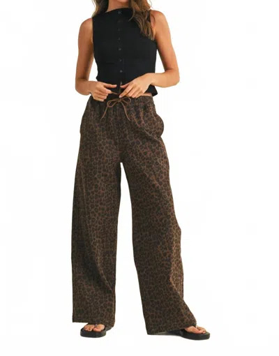 Klesis Leopard Print Wide Denim Track Pant In Brown