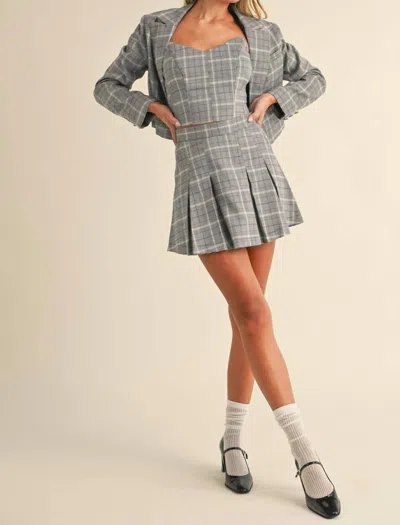 Klesis Plaid Crop Top, Cropped Blazer, And Pleated Mini Skirt In Black Combo