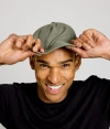 Known Supply Performance Hat In Green