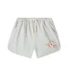 Konges Slojd Seer Asnou Striped Seersucker Swim Trunks In Green