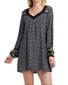 Kori Border Print Swing Dress In Black In Black