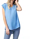 Kori Stare Down The Past Top In Blue In Blue