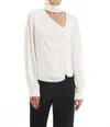 KRISA ASYMMETRICAL KEYHOLE TURTLENECK BLOUSE IN CREAM