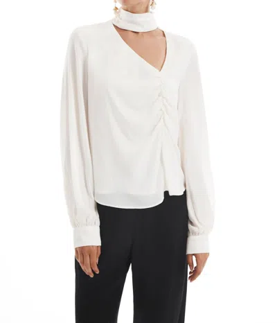 Krisa Asymmetrical Keyhole Turtleneck Blouse In Cream In Beige