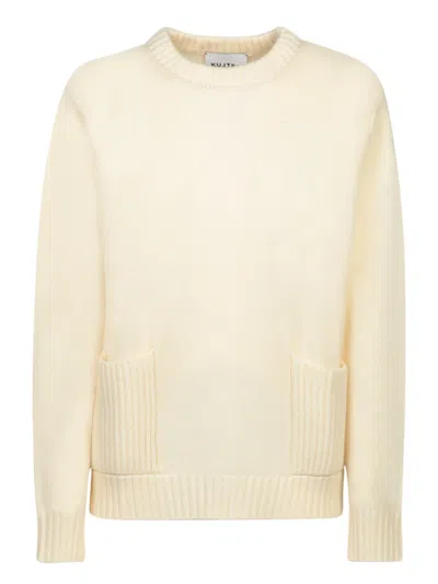 KUJTEN KUJTEN KNITWEAR WITH COZY POCKETS AND REFINED TEXTURE