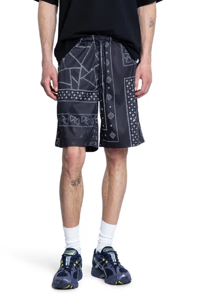 Kuon Man Black&white Shorts & Skirts In Multi