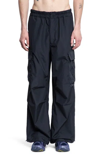 Kuon Trousers In Black