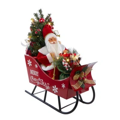 Kurt Adler This 24" Battery Operated Musical Led Santa In Metal Sleigh Table Piece From  In Red