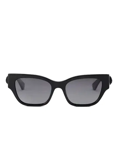 Kurt Geiger Cat-eye-sonnenbrille Mit Adleranhänger In Black