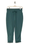 Kyodan Four-way Stretch Woven Capri Pants In Dark Forest