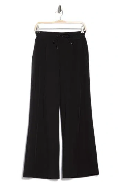 Kyodan Four-way Stretch Woven Wide Leg Pants In Black
