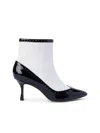 L'agence Ember Wingtip Pointed Toe Bootie In Black/white Patent