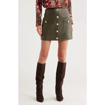 L Agence L'agence Truman Snap Faux Leather Miniskirt In Green