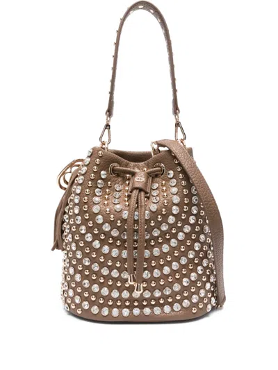 La Carrie Andromeda Studded Tassel Bucket Bag In Neutral