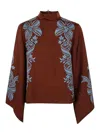 La Doublej Make An Exit Top Placée In Red