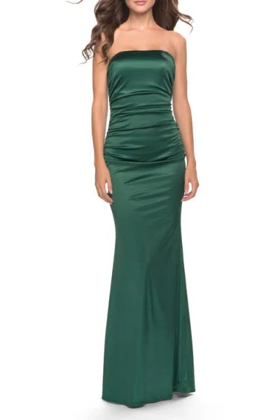 La Femme Chic Strapless Liquid Jersey Gown With Ruching In Metallic
