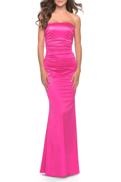 La Femme Chic Strapless Liquid Jersey Gown With Ruching In Hot Pink