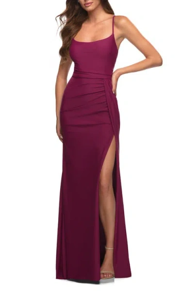 La Femme Jersey Luxe Gown With Draped Slit And Strappy Back In Berry
