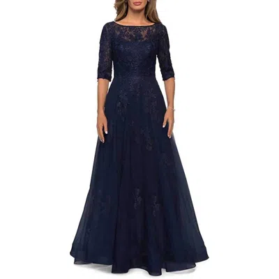 LA FEMME LACE AND TULLE A-LINE GOWN WITH THREE QUARTER SLEEVES IN NAVY