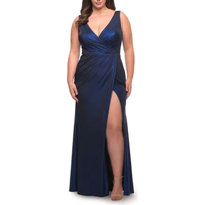 La Femme Metallic Jersey Plus Gown With Slit And V Neckline In Blue