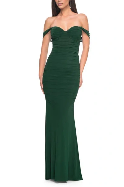 La Femme Off The Shoulder Net Jersey Dress With Ruching In Dark Emerald