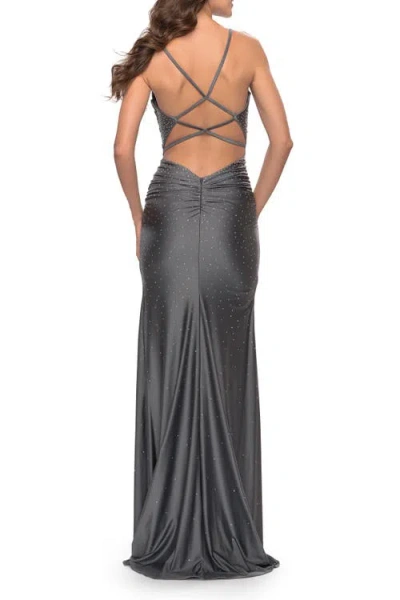 La Femme Rhinestone Jersey Dress With Slit And Ruching In Gunmetal