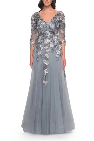 La Femme Tulle A-line Gown With Beautiful Lace Applique And Sheer Sleeves In Slate Blue
