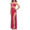 La Femme Unique Jersey Gown With Front Cut Outs And Criss Cross Straps
