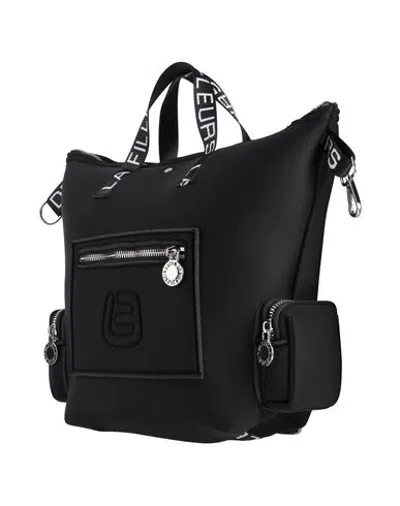 La Fille Des Fleurs Handbags - Backpacks In Black