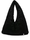 La Milanesa Textured Triangular Shoulder Bag In Black