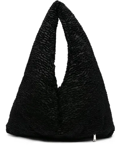 La Milanesa Textured Triangular Shoulder Bag In Black