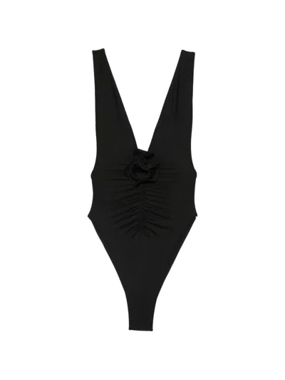 La Reveche Samira Ruched Floral-appliqué Swimsuit In Black