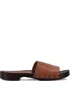 La Rose Studded Leather Clogs In Brown