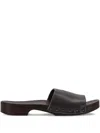 La Rose Studded Leather Clogs In Black