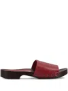 La Rose Studded Leather Clogs In Red