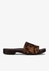 La Rose Leopard Print Studded Leather Clogs In Brown
