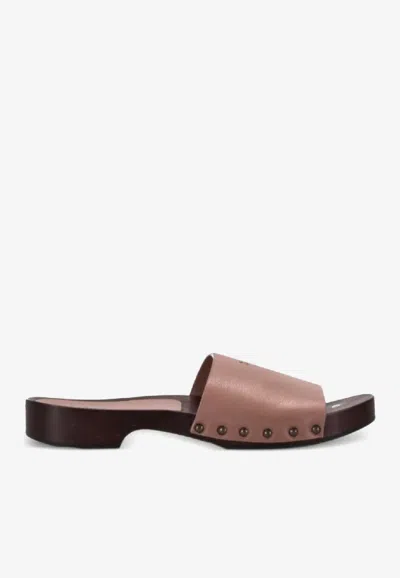 La Rose Studded Leather Clogs In Brown