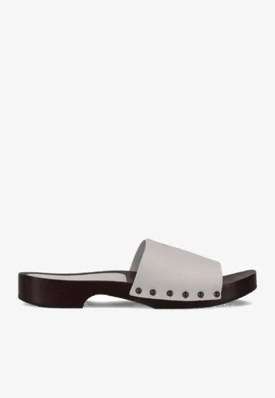 LA ROSE STUDDED LEATHER CLOGS