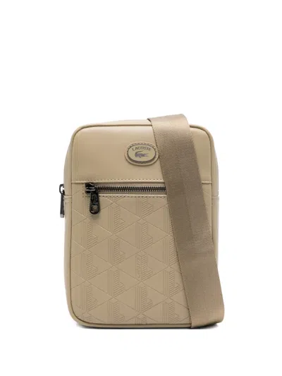 Lacoste Embossed-logo Cross Body Bag In Neutral