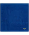 Lacoste Home Heritage Croc Scale Cotton Washcloth, 13" X 13" In Blue