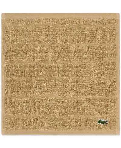 Lacoste Home Heritage Croc Scale Cotton Washcloth, 13" X 13" In Sand