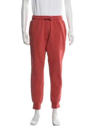 Pre-owned Lacoste Joggers In Orange