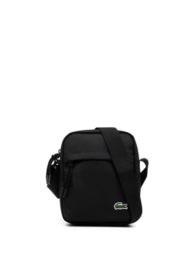 Lacoste Logo-appliqué Messenger Bag In Black