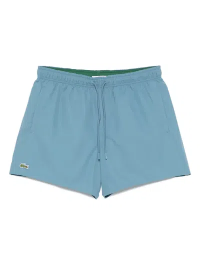 Lacoste Logo-appliqué Swim Shorts In Blue