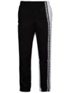 Lacoste Logo Print Track Pants In Black
