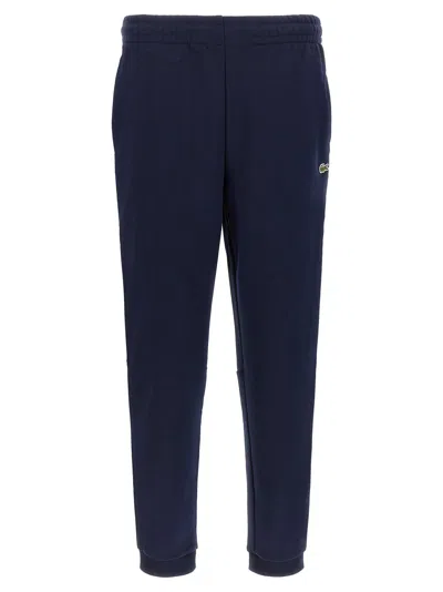 Lacoste Logo-embroidered Cotton Joggers In Blue
